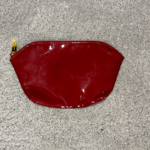 Estee Lauder Handbags - Estee Lauder Red Pattent leather cosmetic pouch!